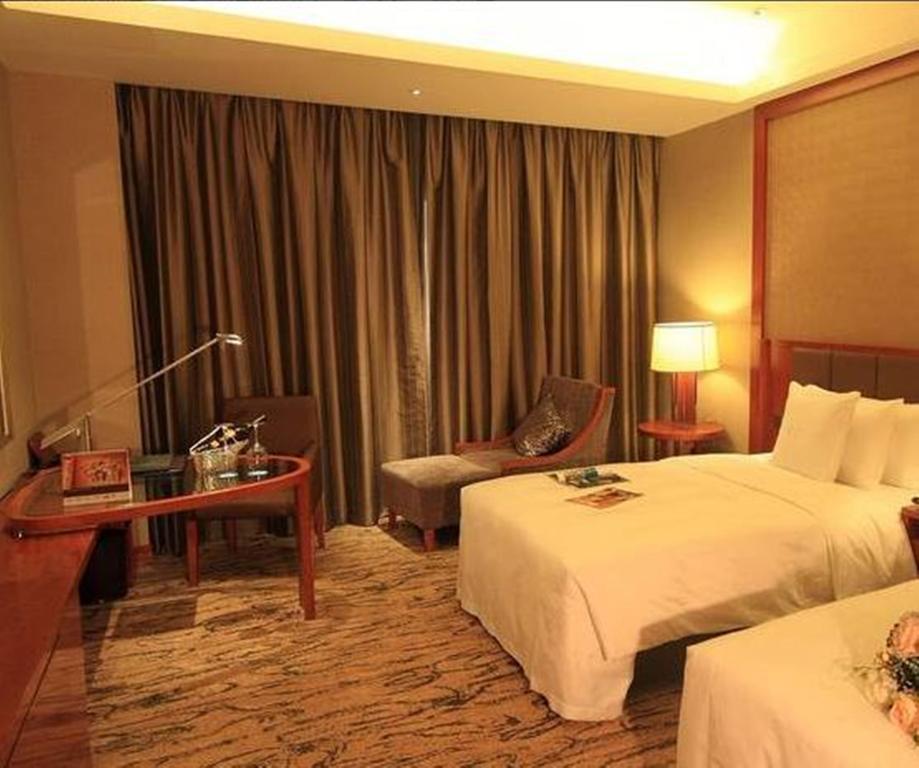 Gloria Grand Hotel Wuxi Wuxi  Buitenkant foto