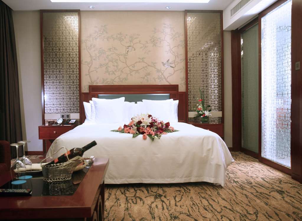 Gloria Grand Hotel Wuxi Wuxi  Kamer foto